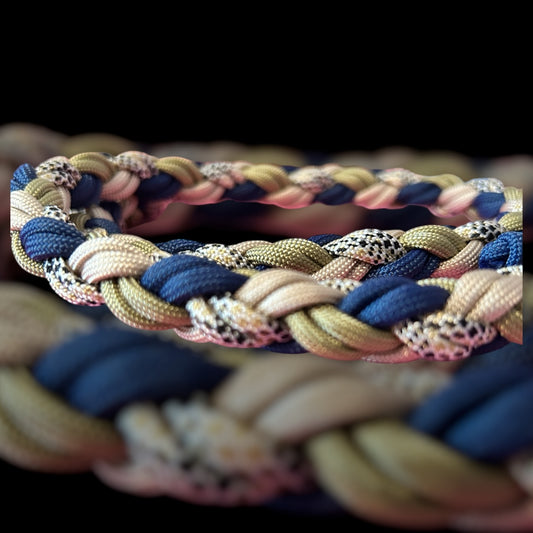 Close-up of braided multicolour paracord with a blurred background